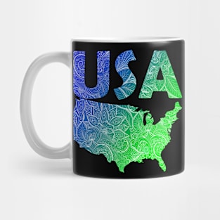 Colorful mandala art map of the United States of America with text in blue and green Mug